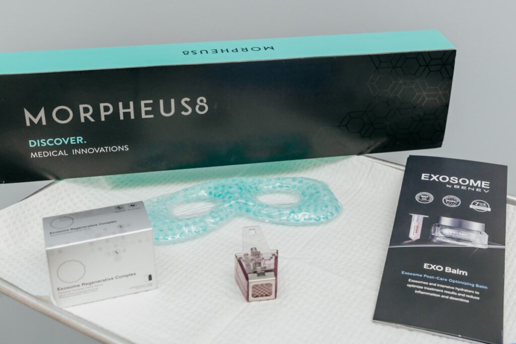 Photo of box, accessories, and pamphlet for Morpheus8 in West Palm Beach, on a treatment tray with white cover.